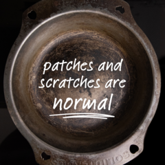 Patches and scratches on seasoned iron pans are okay