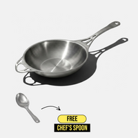 A stainless steel sauté pan with long handles is shown on a light gray background, with a separate chef's spoon below it and a yellow-and-black badge reading 'FREE CHEF'S SPOON' with an arrow pointing up toward the pan.